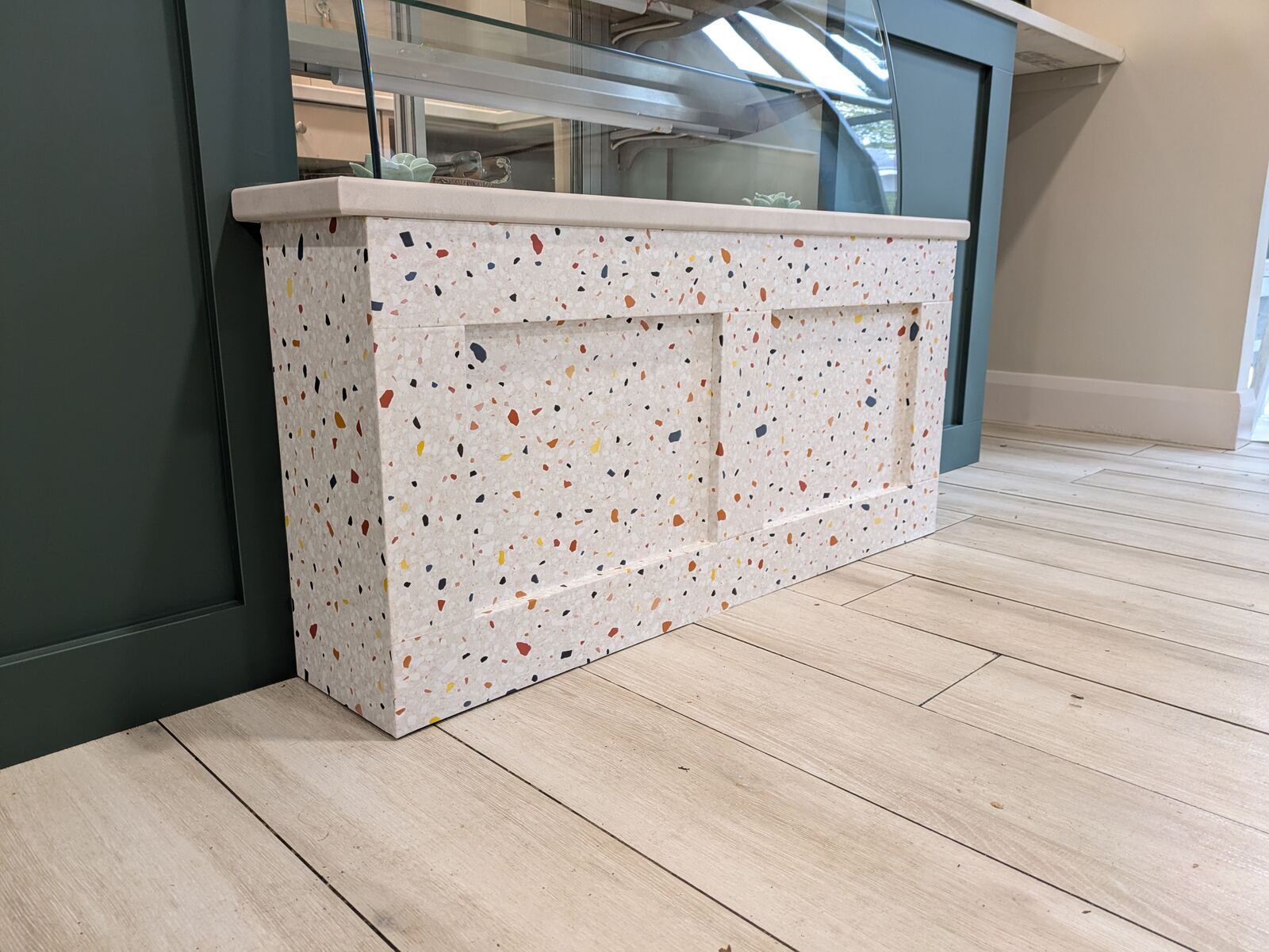 Close up detail of terrazzo-effect vinyl wrap on cafe counter